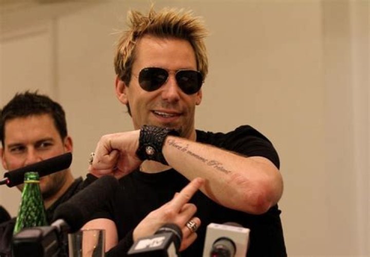 Chad Kroeger tattoo.. same as Avril's! THEY GOT MATCHING TATTOO'S&hellip;SOO
